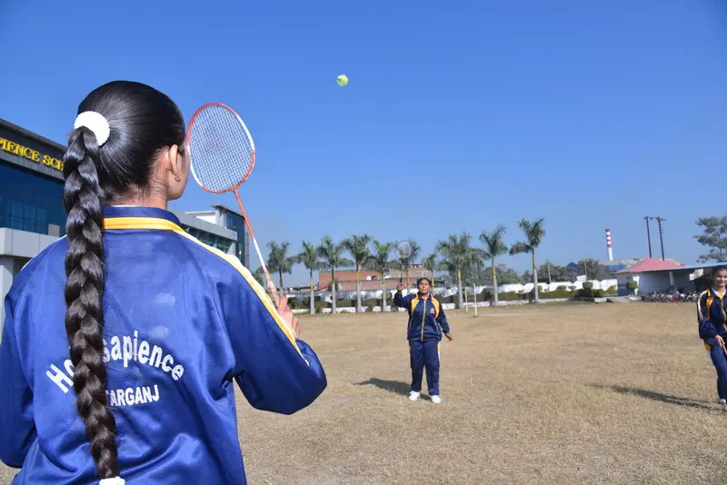 A badminton player waiting for the shuttle