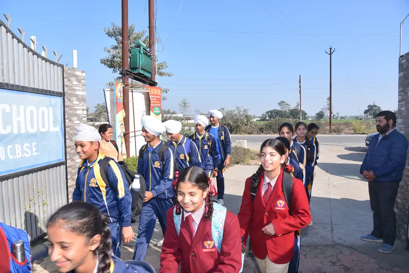 Students leaving through the school gate