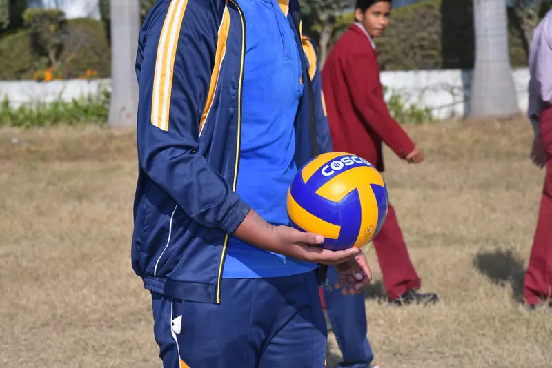 A player holding a volleyball